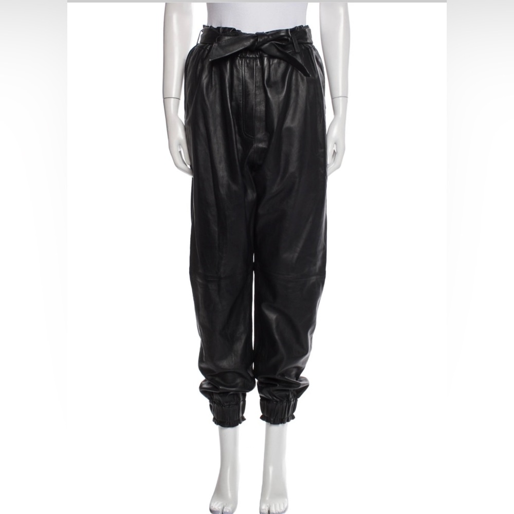 MUNTHE talca pant in black size 38, 6 or 8. There is a small scratch on the back